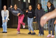 Leerlingen in danspose tijdens een workshop